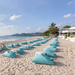 On the beach, sun loungers, beach umbrellas, beach towels
