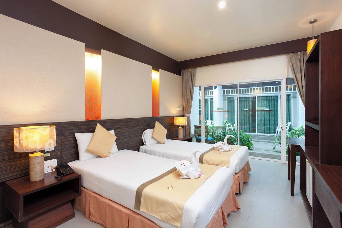 ห้องสแตนดาร์ดทวิน, ติดสวนหย่อม | มินิบาร์, ตู้นิรภัยในห้องพัก, โต๊ะทำงาน, ผ้าม่านกันแสง