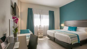 Triple Room, 3 Twin Beds | In-room safe, desk, blackout drapes, soundproofing