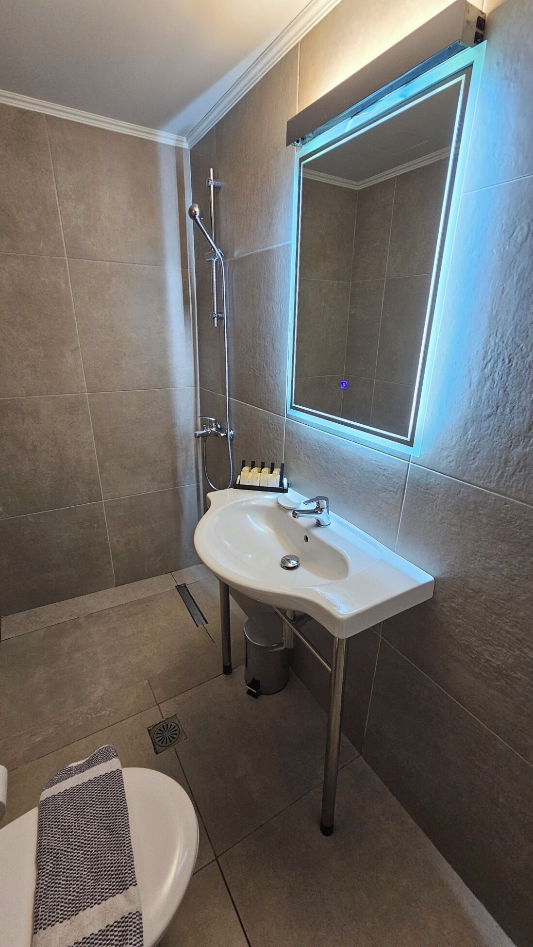 shower, rainfall showerhead, designer toiletries, hair dryer