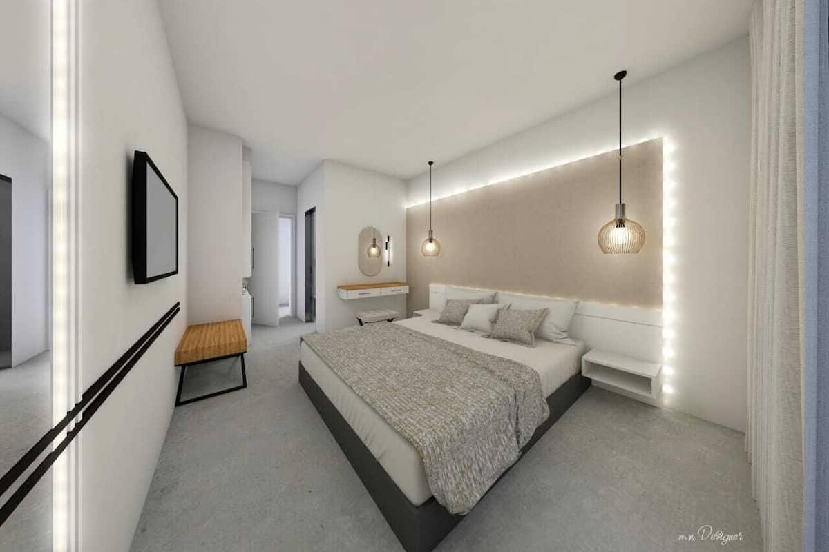 Ein modernes Schlafzimmer mit einem großen Bett, Nachttischen und Pendelleuchten.