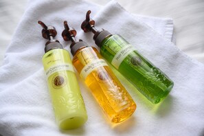 Three bottles of hair conditioner on a white towel. - Hotel MyStays Nagoya - Sakae (Nagoya)