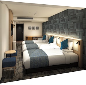 Une chambre d’hôtel moderne dotée d’un grand lit, d’un bureau et d’un coin salon.