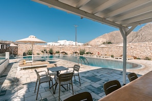 Outdoor pool, open 9:00 AM to 8:00 PM, pool umbrellas, sun loungers