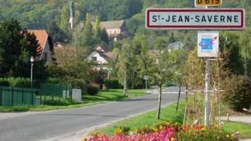 A rural road with a sign for St.-Jean-Saverne and a D619 route marker.