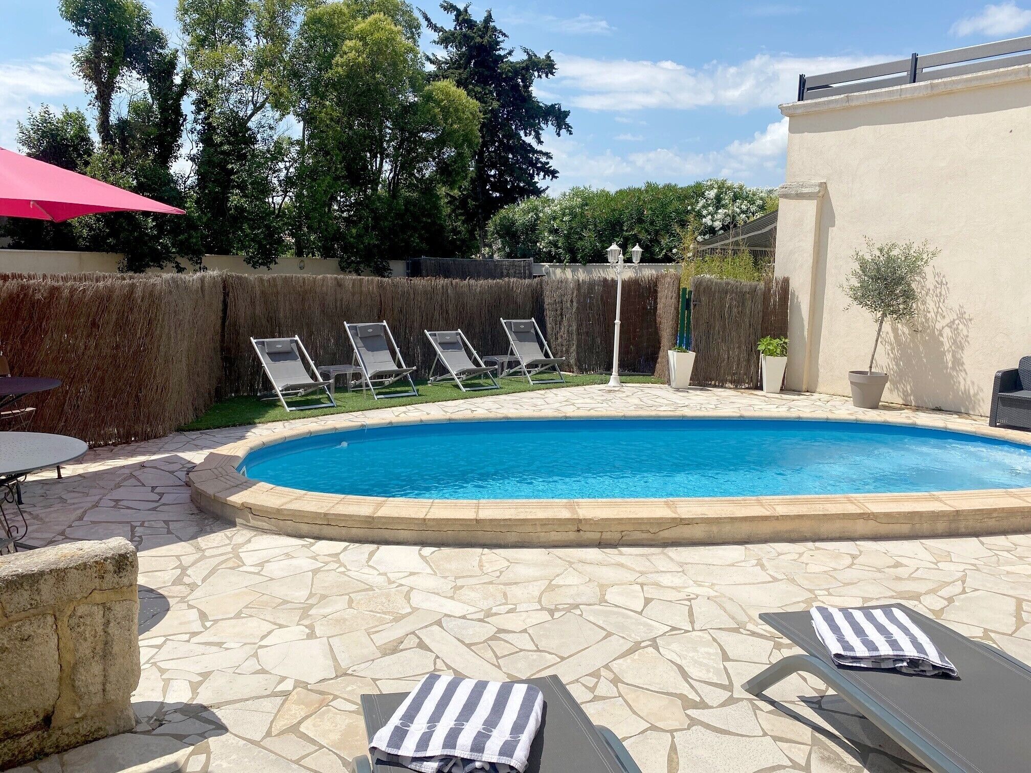 Seasonal outdoor pool, open 9:30 AM to 8:00 PM, sun loungers