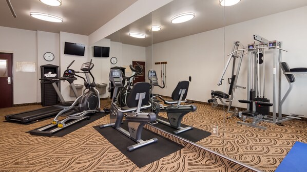 A fitness center with treadmills, elliptical machines, and weight machines. - Best Western Abbeville Inn & Suites (Abbeville)