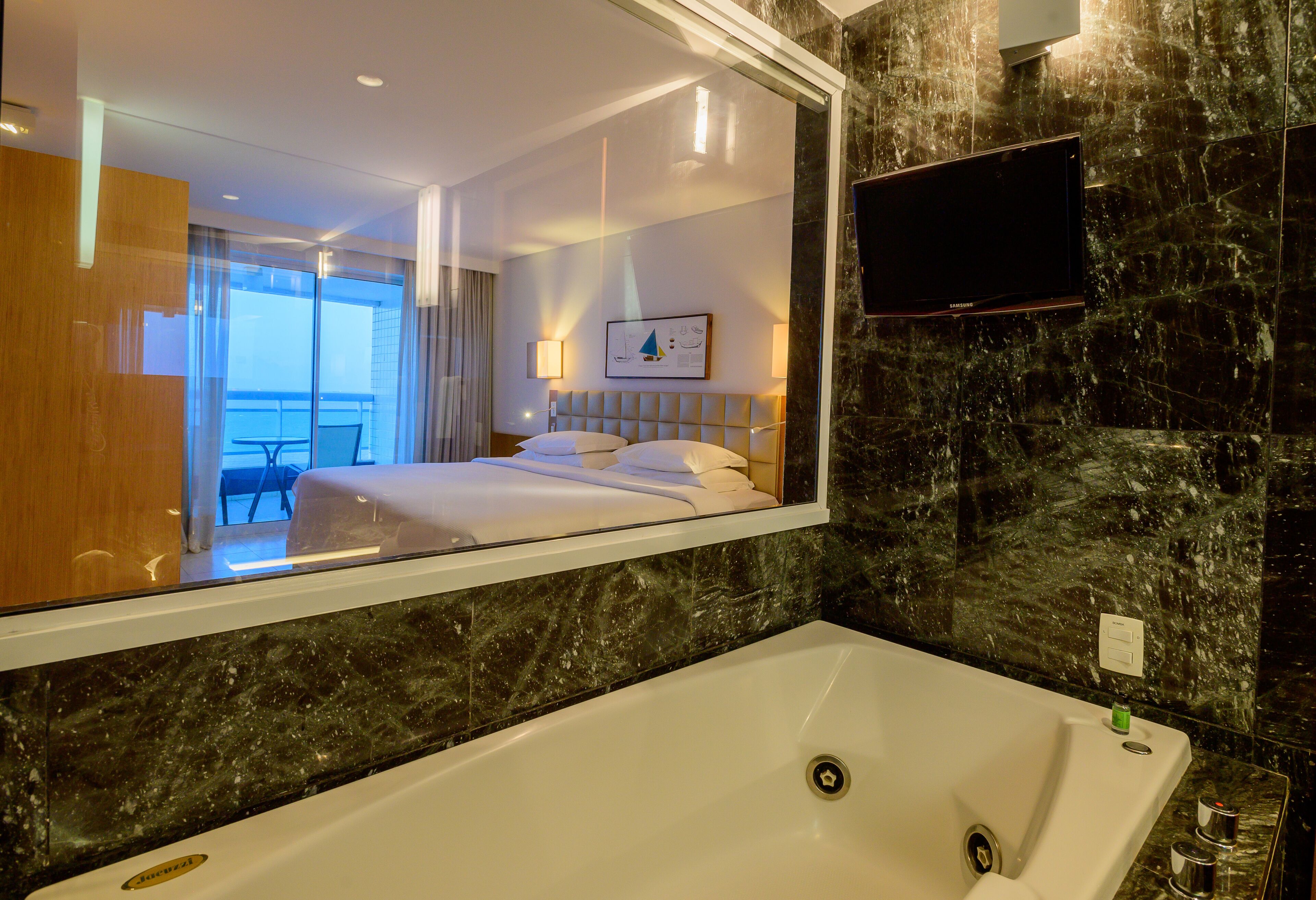 executive suite, sea view | bathroom | hair dryer, towels, soap, shampoo