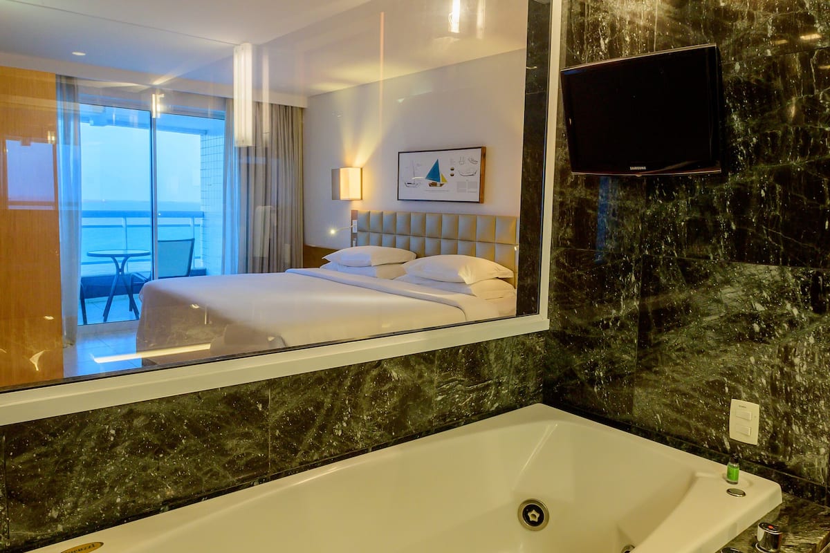 executive suite, sea view | bathroom | hair dryer, towels, soap, shampoo