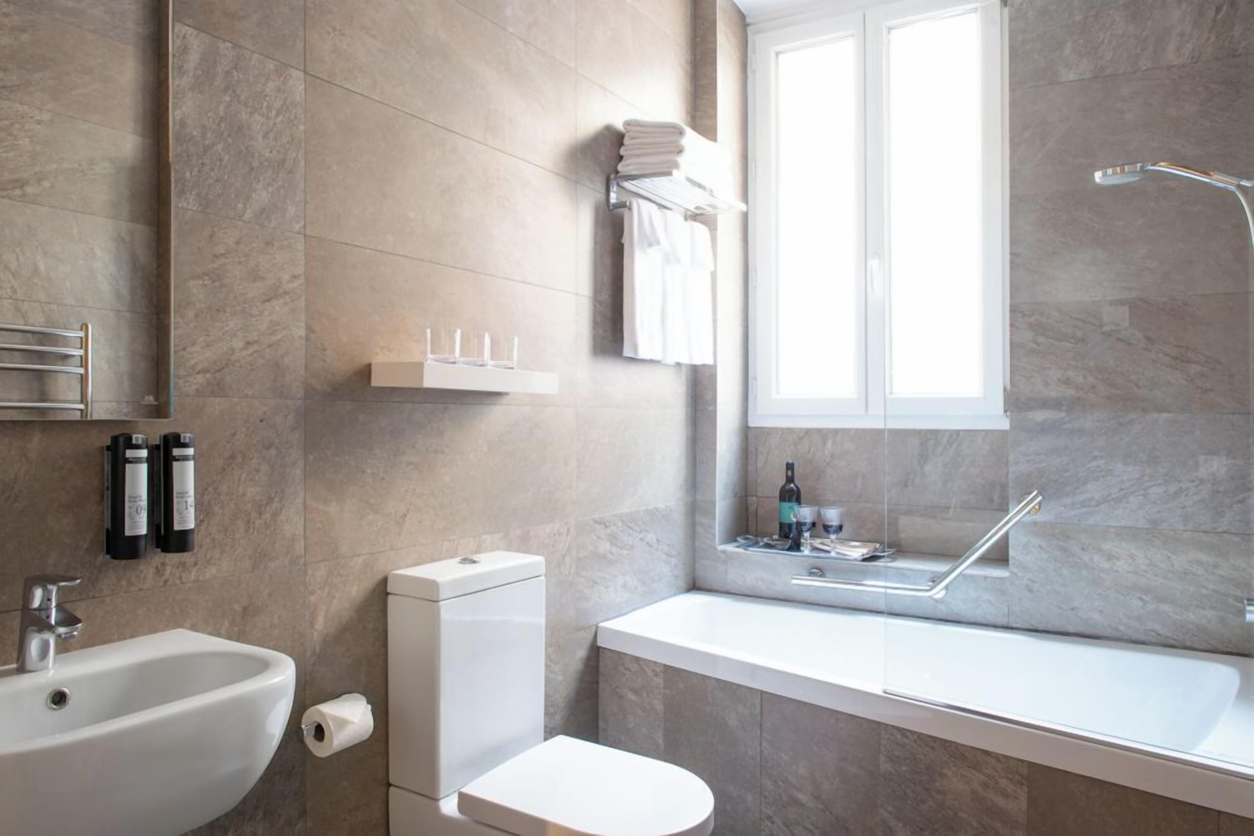 premium twin room | bathroom | free toiletries, hair dryer, towels