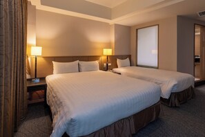 Chambre triple Standard | Rideaux d’obscurcissement, système d’insonorisation