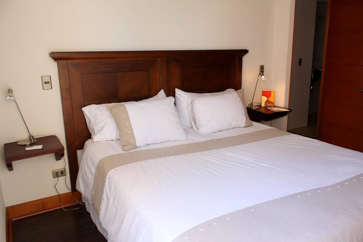 Premium bedding, down duvets, in-room safe, desk