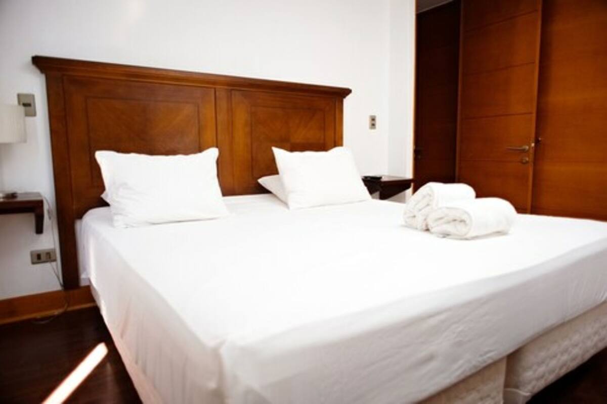 Premium bedding, down duvets, in-room safe, desk