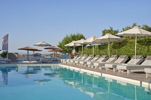 3 outdoor pools, open 9:00 AM to 7:00 PM, pool umbrellas, sun loungers