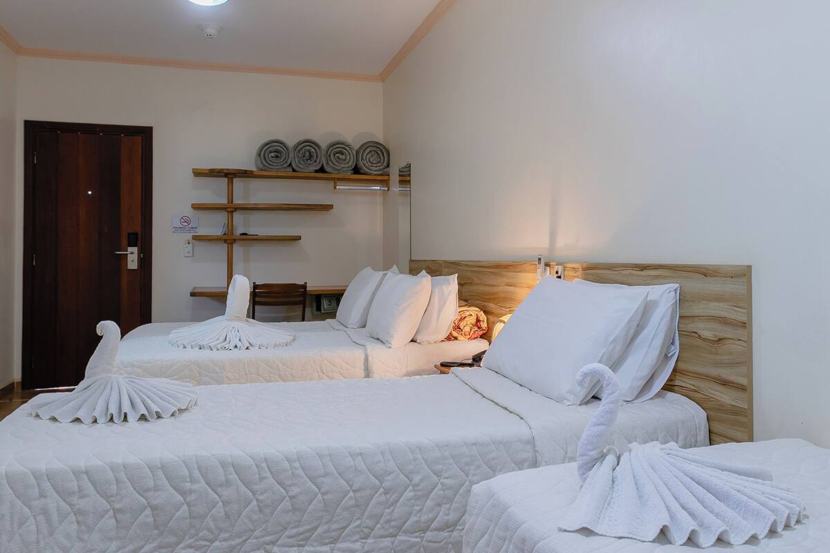 Standard Quadruple Room | Minibar, in-room safe, WiFi (free), bed sheets