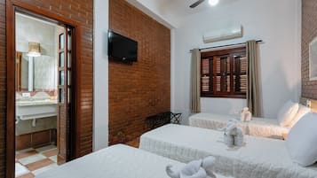 Standard Triple Room | Minibar, in-room safe, free WiFi, bed sheets