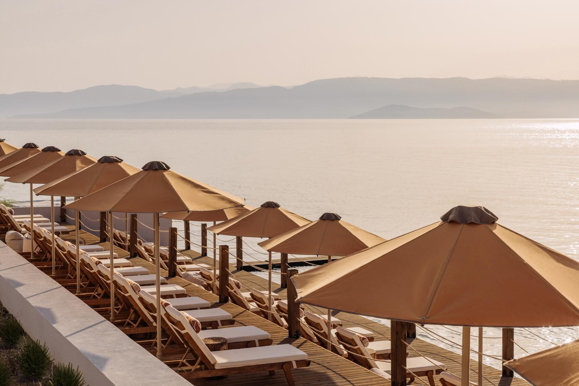 On the beach, sun-loungers, beach umbrellas, beach towels