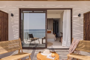 Suíte júnior, vista para o mar | Roupas de cama premium, cofres nos quartos
