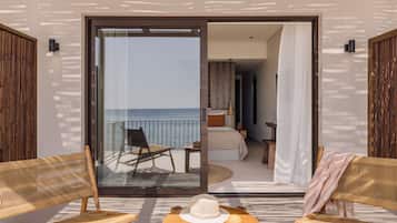 Suite junior, vista al mar | Terraza o patio