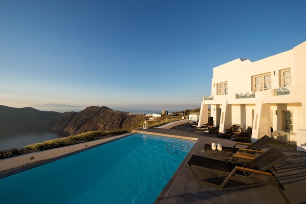 Outdoor pool, pool umbrellas, pool loungers
