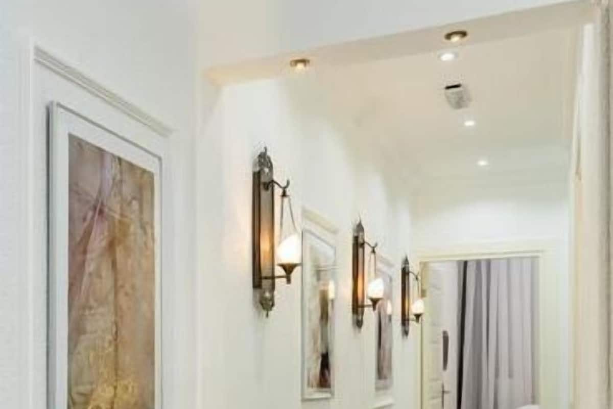 Luxe appartement, 2 badkamers | Een minibar, een kluis op de kamer, verduisterende gordijnen