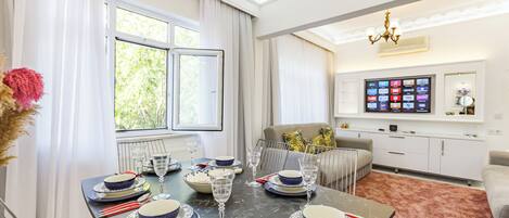 Bayram Palace - Luxury Apartment, Annex Building | Living area | 85-inch LCD TV with satellite channels, Netflix, streaming services