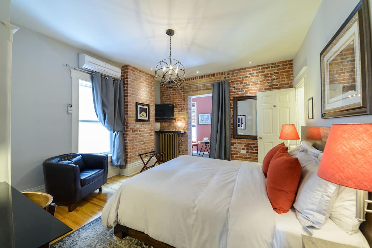 Deluxe Suite, Non Smoking, Balcony | Premium bedding, down comforters, desk, blackout drapes