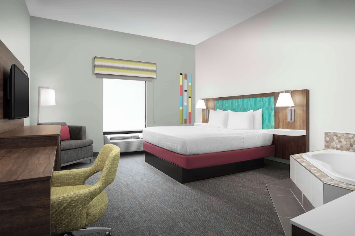 suite, 1 king bed, non smoking | desk, laptop workspace, blackout curtains, iron/ironing board