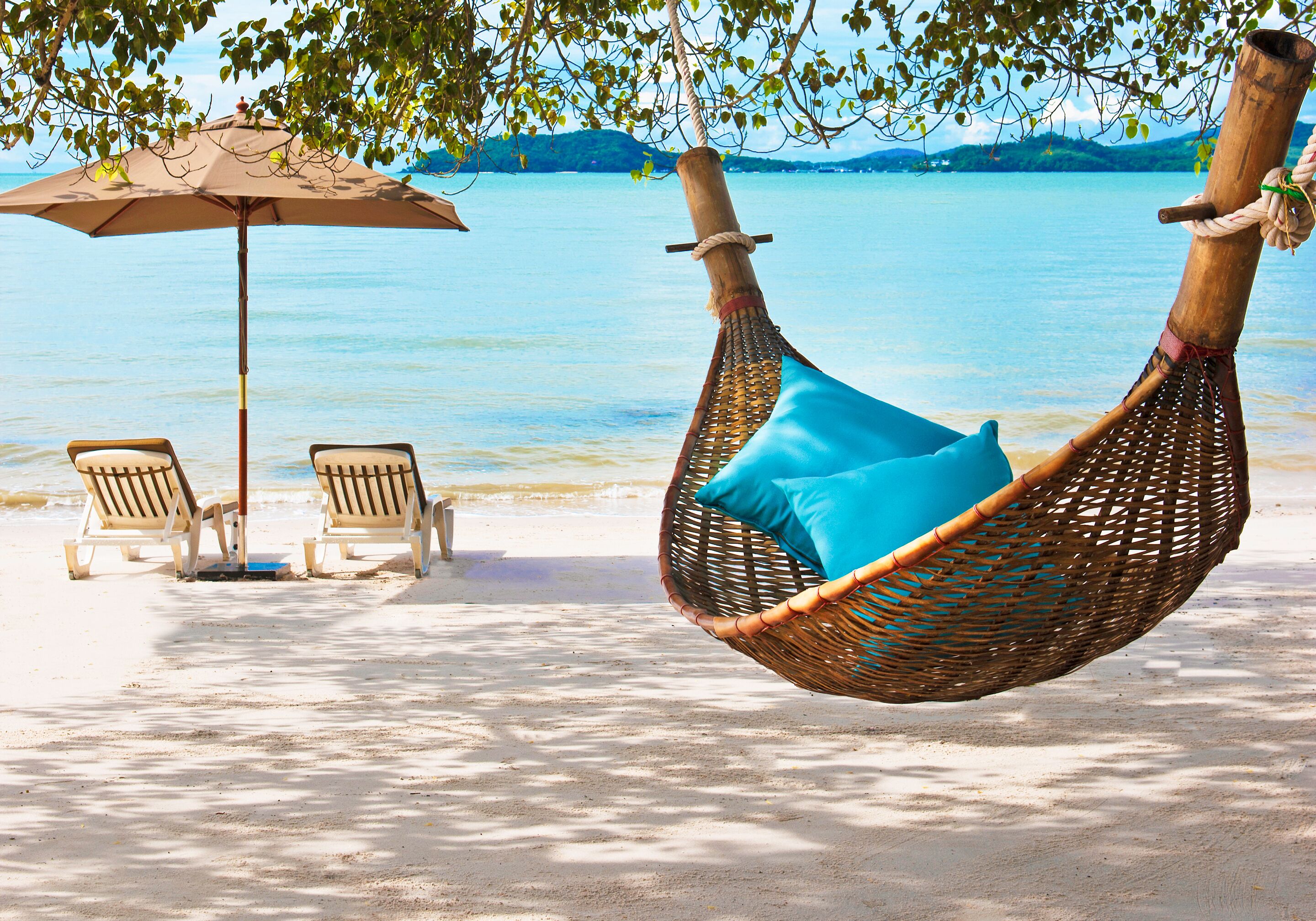 On the beach, sun-loungers, beach umbrellas, beach towels