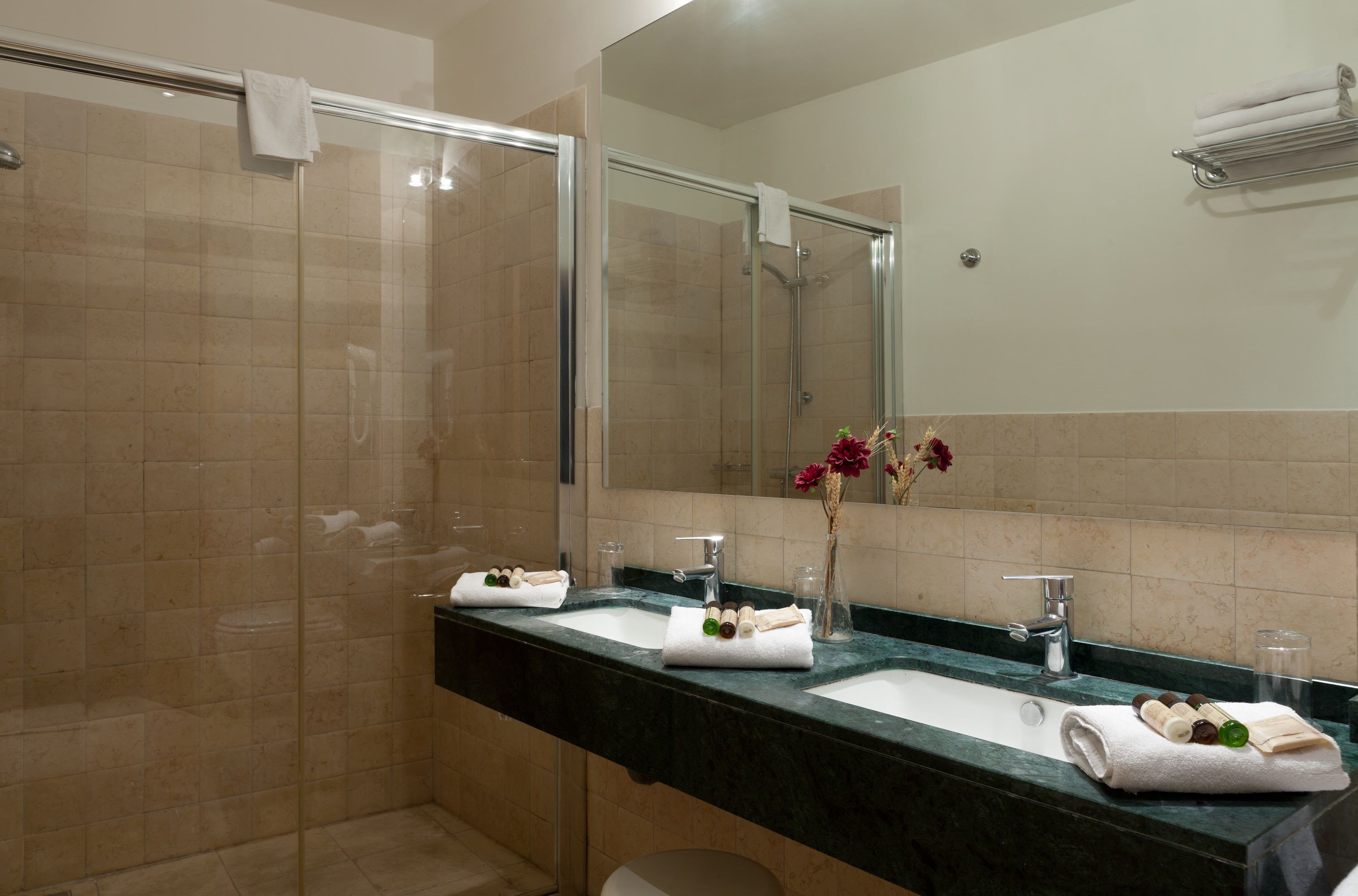 free toiletries, hair dryer, bidet, towels