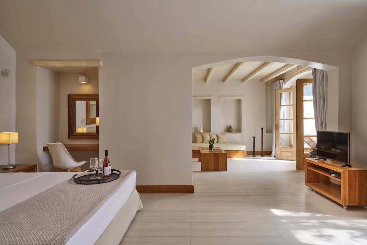 honeymoon studio suite, jetted tub | living area | 32-inch led tv with satellite channels, tv