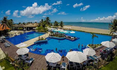 Outdoor pool, pool loungers. Serrambi Resort