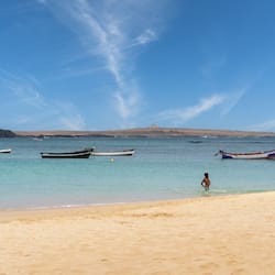 On the beach, white sand, beach umbrellas, beach bar