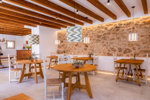 Breakfast, lunch, dinner served; Mediterranean cuisine, garden views