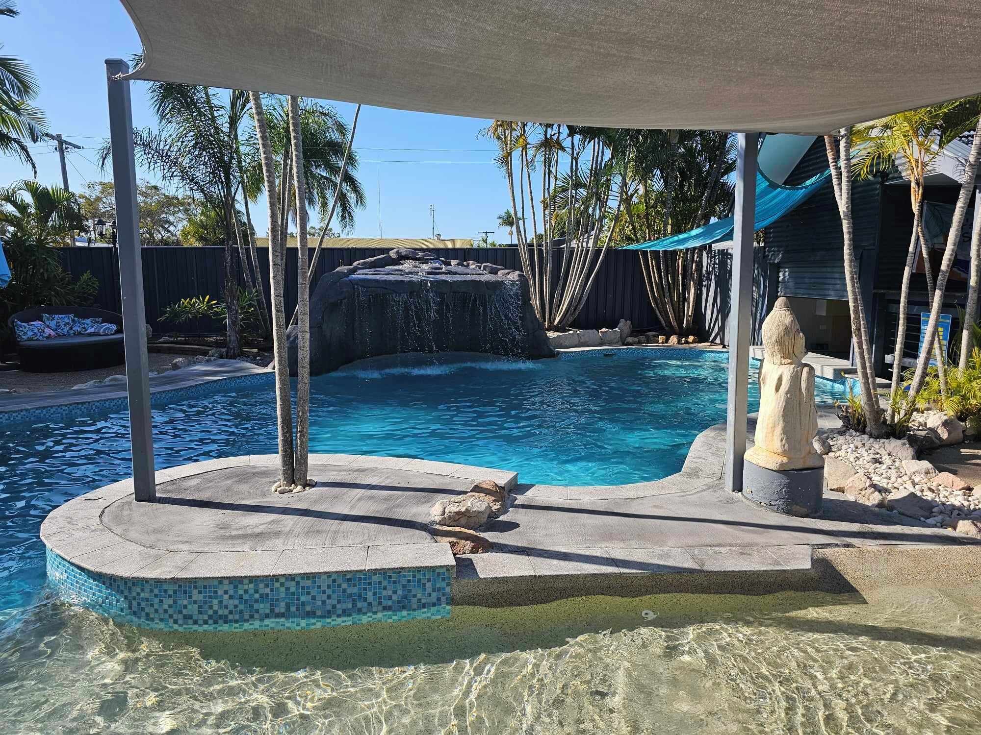 Outdoor pool, open 8:00 AM to 10:00 PM, pool umbrellas, pool loungers