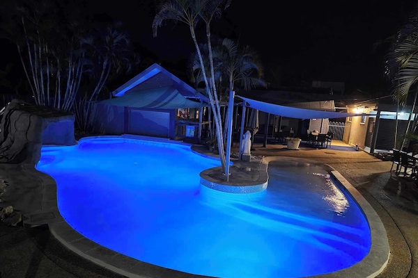 Outdoor pool, open 8:00 AM to 10:00 PM, pool umbrellas, pool loungers