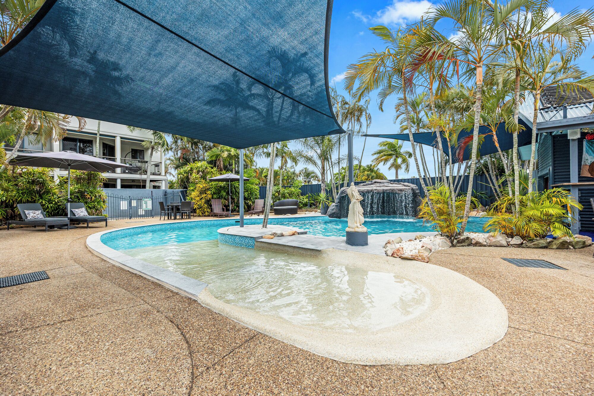 Outdoor pool, open 8:00 AM to 10:00 PM, pool umbrellas, sun loungers