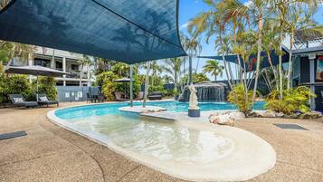 Outdoor pool, open 8:00 AM to 10:00 PM, pool umbrellas, sun loungers