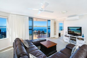 Absolute Waterfront 2 Bedroom Apartment | Living room | LCD TV, pay films - Watermark Resort Caloundra (Caloundra)