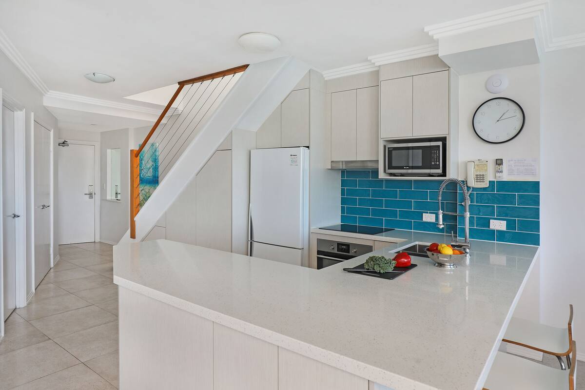 absolute waterfront 2 bedroom penthouse apartment with rooftop and spa  | private kitchen | fridge, microwave, electric kettle, high chair