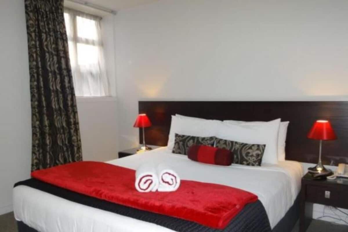 Premium bedding, laptop workspace, soundproofing, iron/ironing board