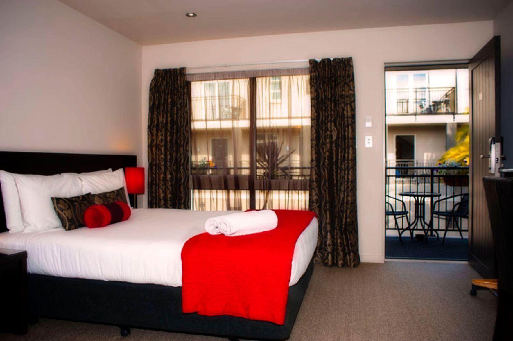 Premium bedding, laptop workspace, soundproofing, iron/ironing board