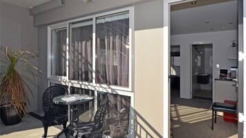 Premium bedding, laptop workspace, soundproofing, iron/ironing board