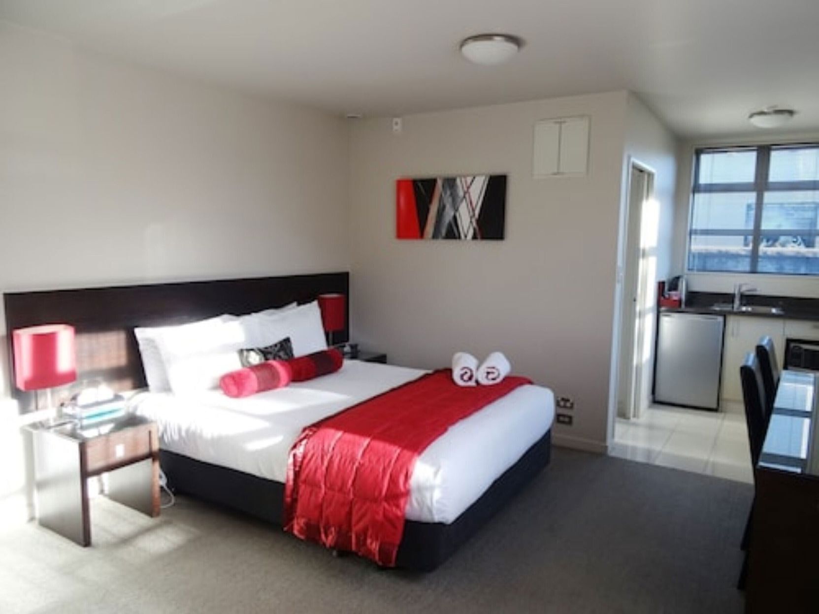 Premium bedding, laptop workspace, soundproofing, iron/ironing board