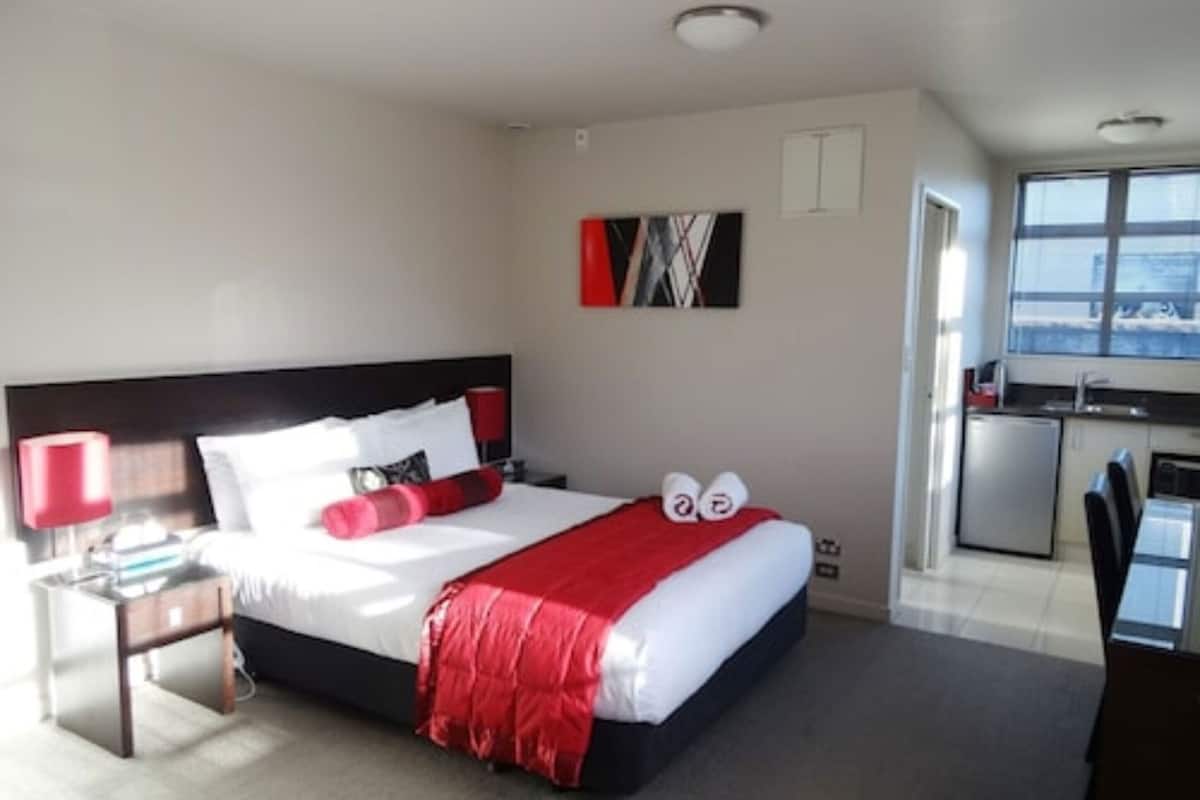 Premium bedding, laptop workspace, soundproofing, iron/ironing board