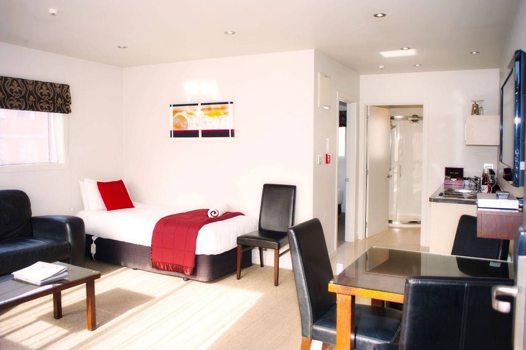 Premium bedding, laptop workspace, soundproofing, iron/ironing board