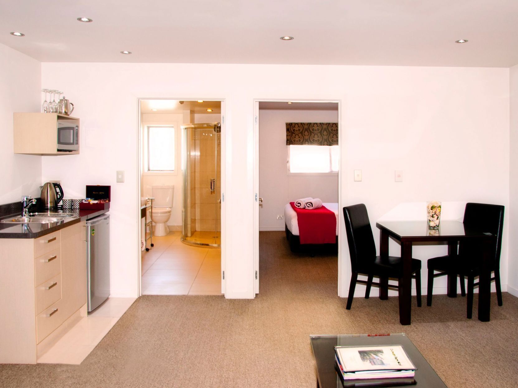 Premium bedding, laptop workspace, soundproofing, iron/ironing board