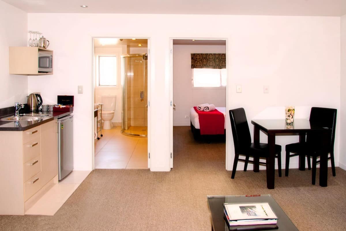 Premium bedding, laptop workspace, soundproofing, iron/ironing board