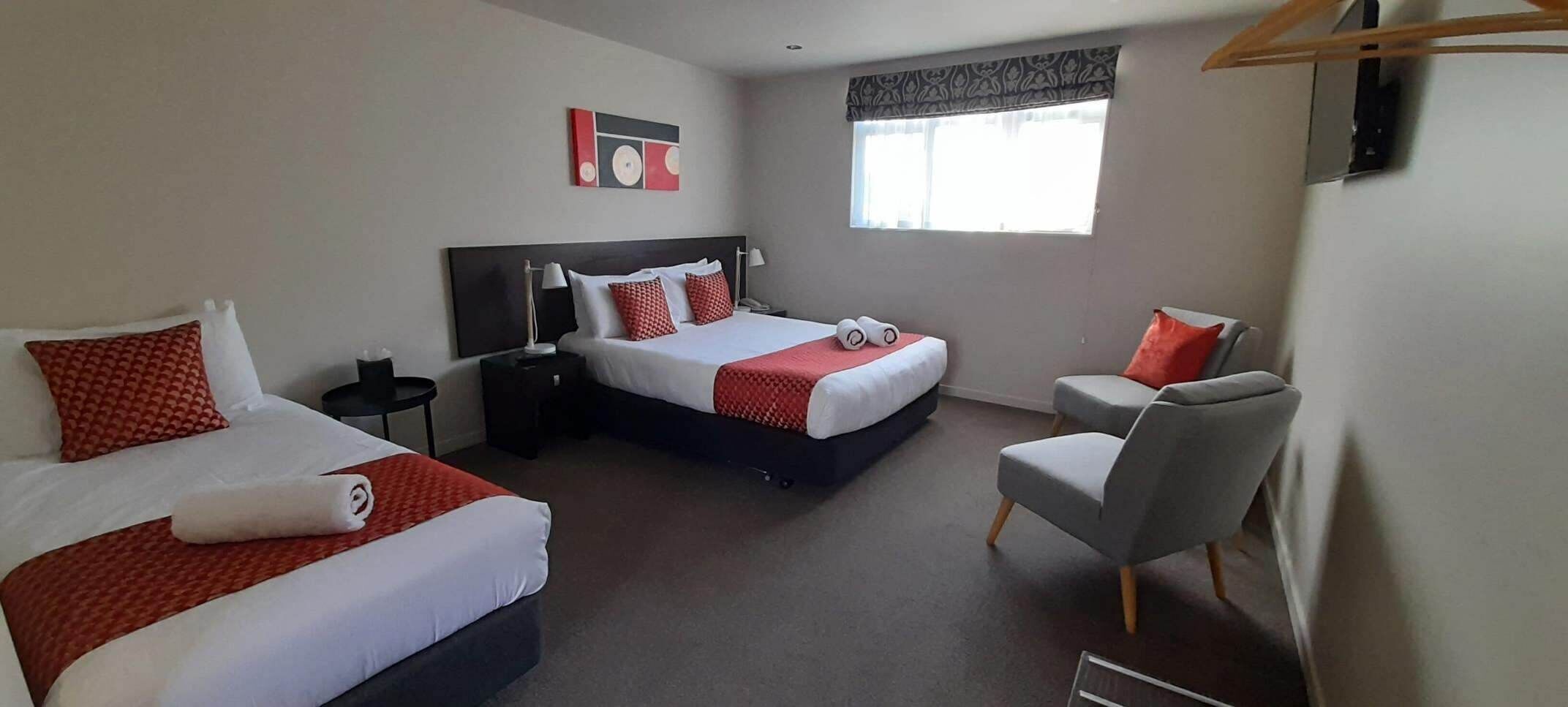 Premium bedding, laptop workspace, soundproofing, iron/ironing board