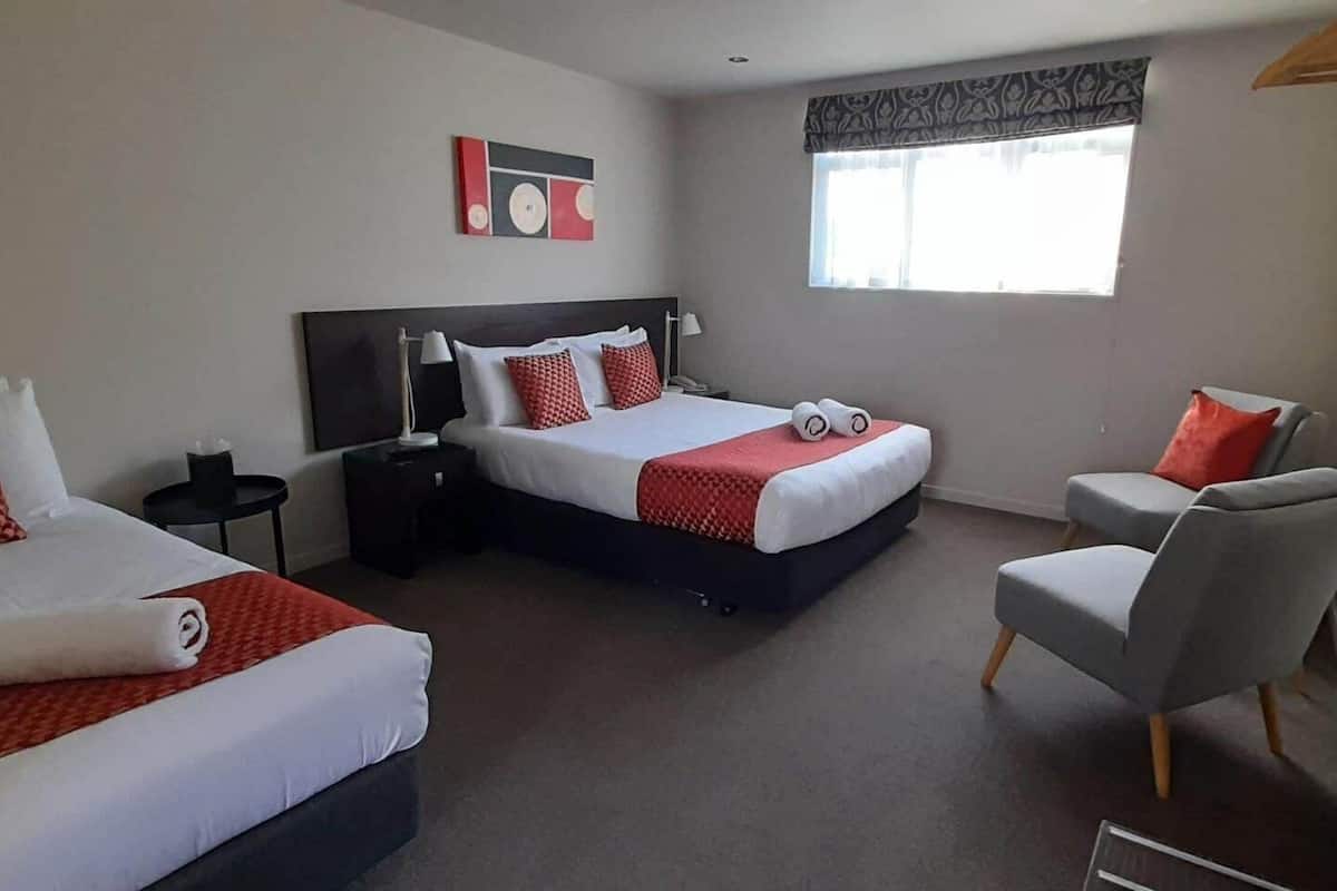 Premium bedding, laptop workspace, soundproofing, iron/ironing board